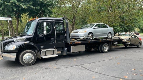Gardner Towing LLC tow truck on Maple Lake isthmus in Paw Paw, Michigan