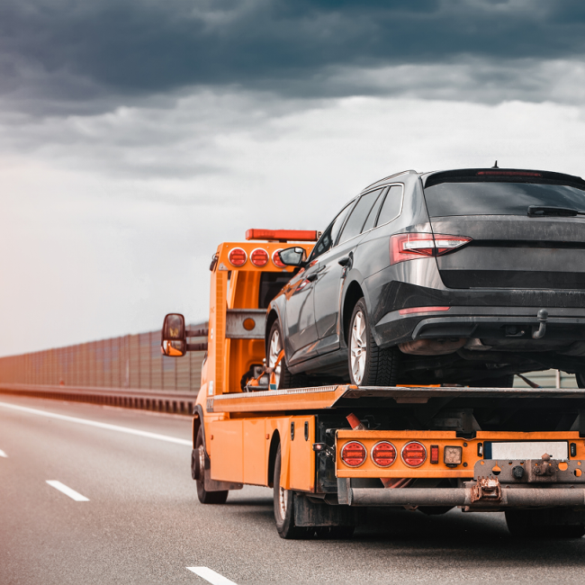 Gardner Towing LLC flatbed tow truck providing emergency towing services in St Joseph Michigan